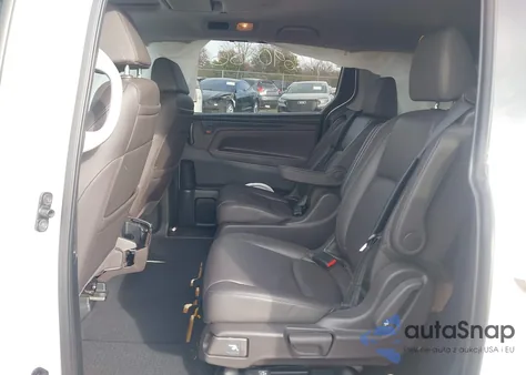 2020 Honda Odyssey Elite z USA, uszkodzony, nr VIN 5FNRL6H94LB045159